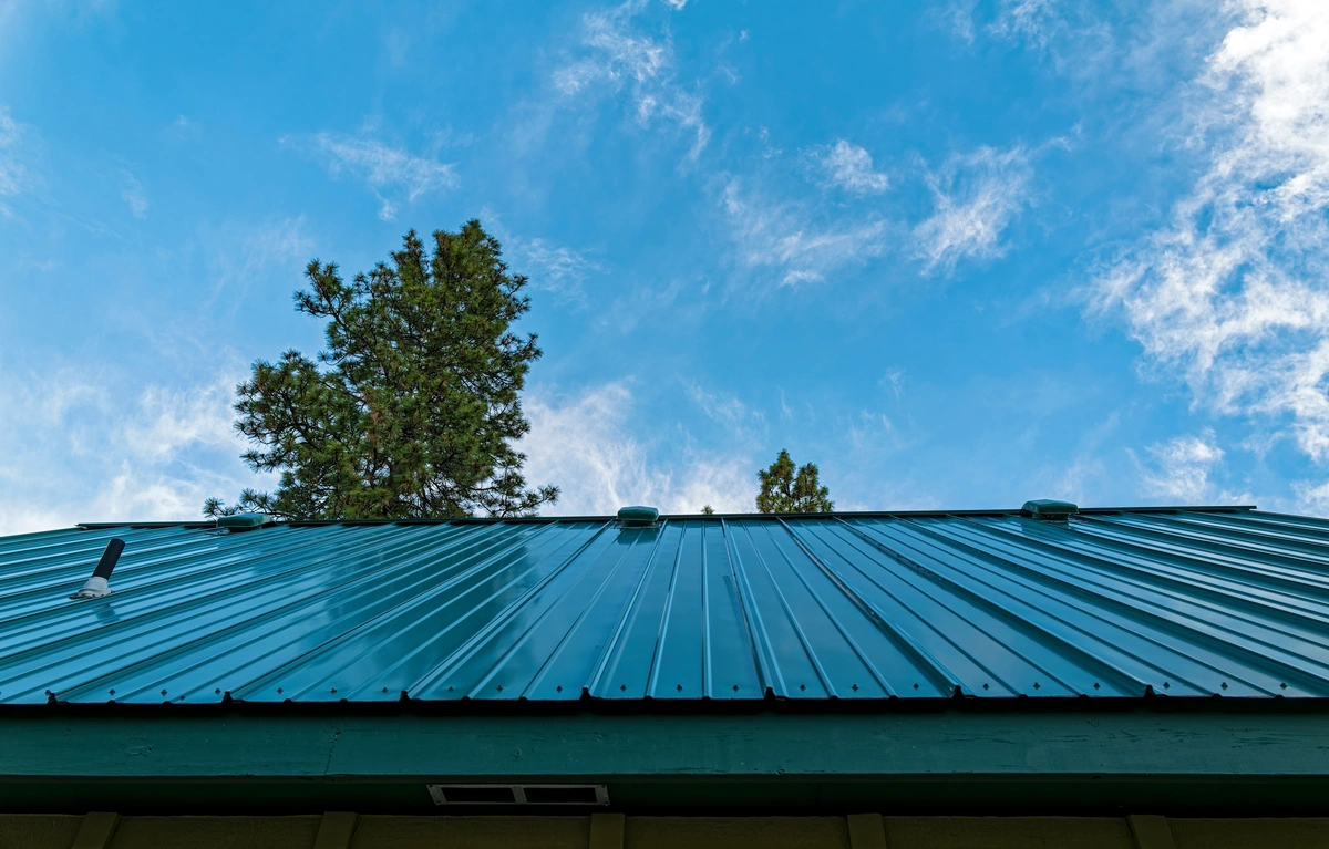 a green standing seam metal roof