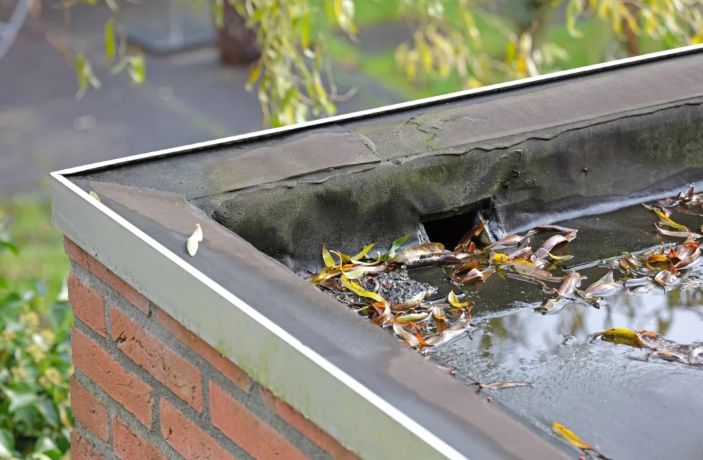close up view of flat roofing system with drainage system