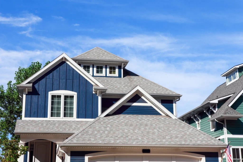 residential home in Springfield PA with blue siding and grey shingle roof