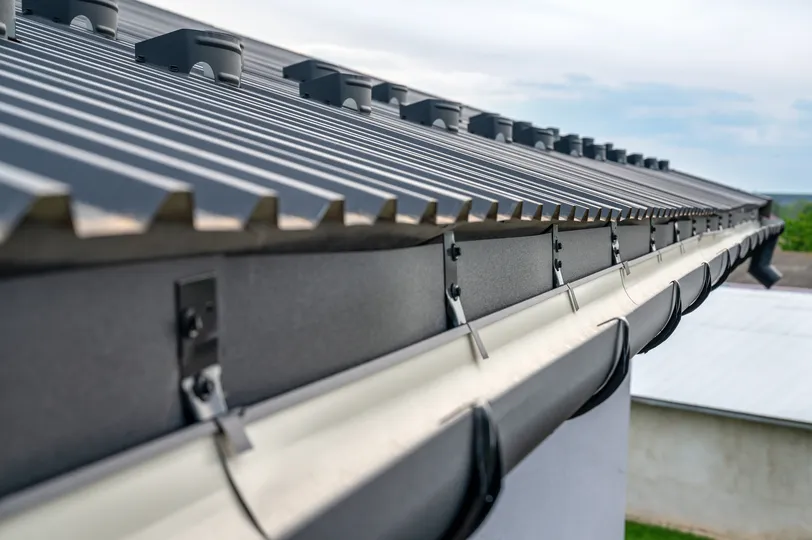 Black metal gutters on a home in Pennsylvania