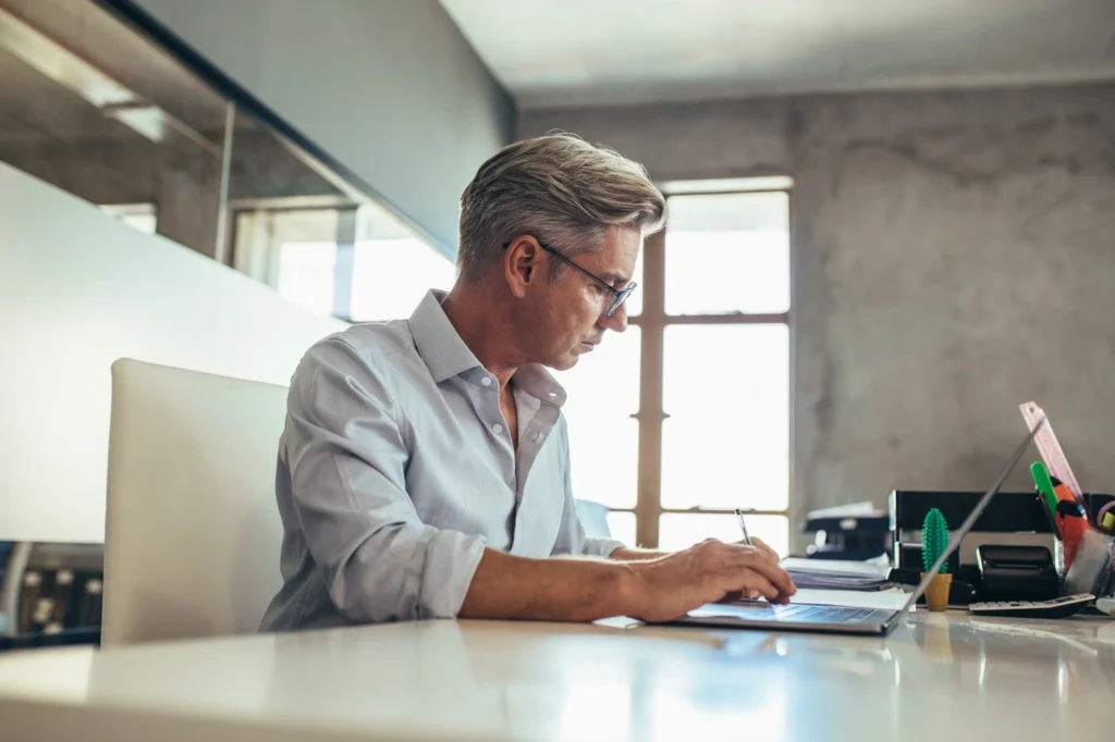 man working on his desk