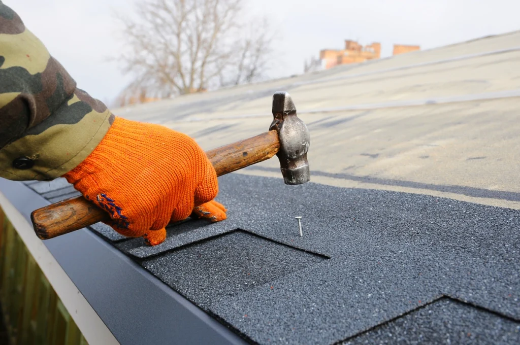 close up to asphalt shingle nailing