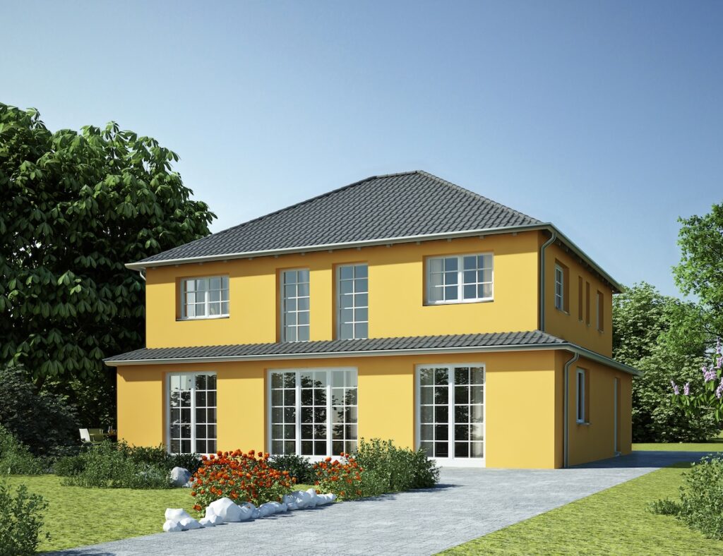 A modern two-story yellow house with a gray tiled hip roof