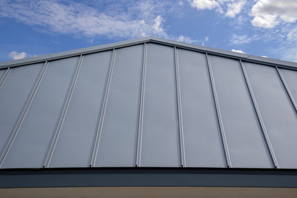 A close-up view of a slanted standing seam metal roof