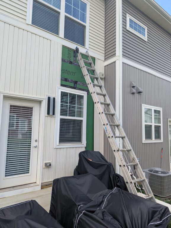 siding repair ladder access rear townhome exton pa 02